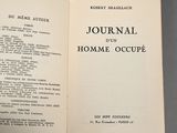 an open book with a list of articles on it