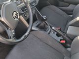 a car dashboard with a steering wheel and a dash board