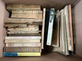 a box full of books that are sitting on a table