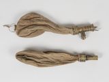 pair of antique wooden handles with metal handles on a white surface