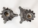 pair of antique cast iron candlestick holders