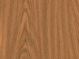 a close up of a wooden surface with a brown stain
