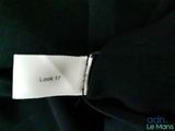 a close up of a label on a black shirt that says look 17