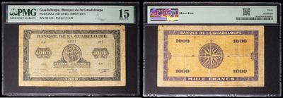 three different types of currency are on display in a display case