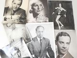 several old black and white photographs of men and women
