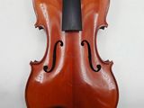 an old violin with a black bow on a white background