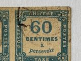 four different stamps on a piece of paper on the wall