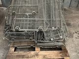 two cages that are sitting on top of a pallet