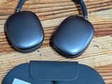 a close up of a pair of headphones on a wooden floor