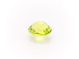 a yellow quartz stone on a white background