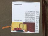 a piece of paper with a picture of a person laying on a bed