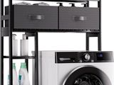 une photo d'une buanderie avec une machine à laver et un sèche-linge