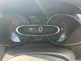 a close up of a car dashboard with a speedometer and gauges
