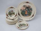 many plates that are sitting on a table