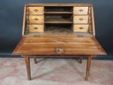 an old wooden desk with drawers and drawers on top of it