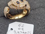 an image of a gold ring with diamonds and a price tag