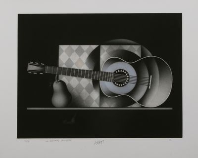 a black and white photo of a guitar on a table