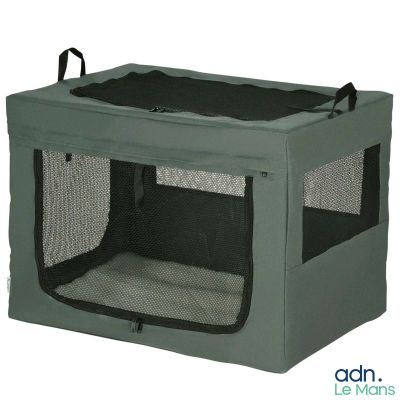 une image représentant une petite cage de transport verte pour chien, avec un couvercle noir