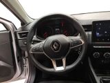 the interior of a car with a steering wheel and dashboard controls
