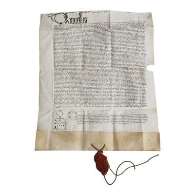 une feuille de papier sur laquelle est posée une feuille d'arbre