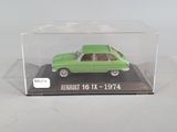 the green car is in a clear box on a white surface