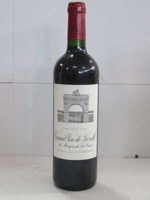 a bottle of wine that is sitting on a table