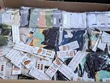 a cardboard box filled with many different types of items