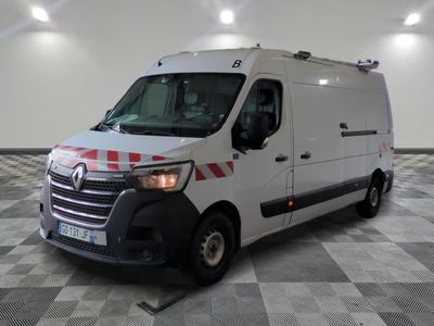 a white van with red and white stripes parked on a checkered floor