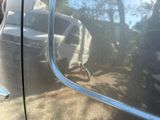 a reflection of a car on the side of the road