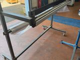 an image of a table with a television on top of it