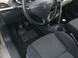 the interior of a car with a steering wheel and dashboard