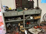 a workbench with a lot of tools on top of it