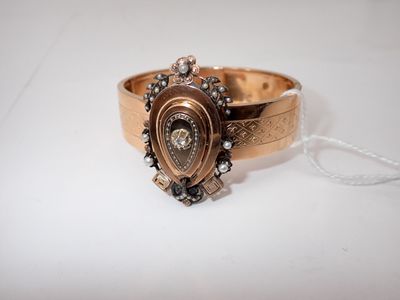 an image of a close up of a ring on a white surface