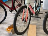 two bikes that are sitting on the floor in the store