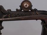 a close up of a sewing machine on a table