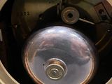 a close up of a clock that is in a room