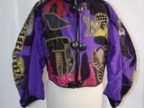 a close up of a mannequin torso with a purple jacket on it