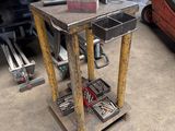 a work table with tools on it in a garage