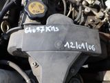 a close up of a motorcycle engine with a tag on it