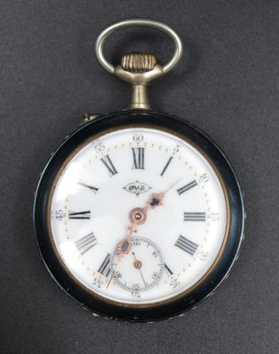 a close up of a pocket watch with roman numerals on it