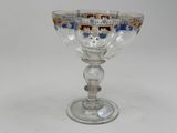 an image of a glass goblet sitting on a table