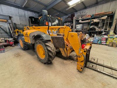 a picture of a construction vehicle parked in a garage