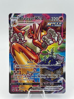 a close up of a pokemon card on a white surface