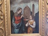 une image représentant un tableau où figure une femme avec un enfant