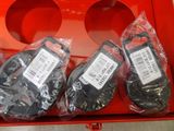 three pairs of shoes that are in a red box