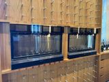 bottles of wine are lined up on the shelves in the wine cellar