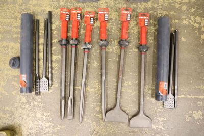 a lot of tools that are laying out on the floor