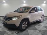 La Honda CR-V est garée sur un sol en carrelage à damier.