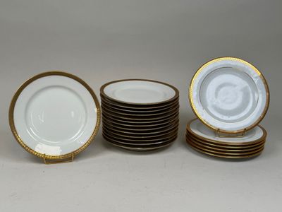 several plates are stacked on top of each other on a table