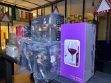a box of wine sitting on a table next to a box of wine